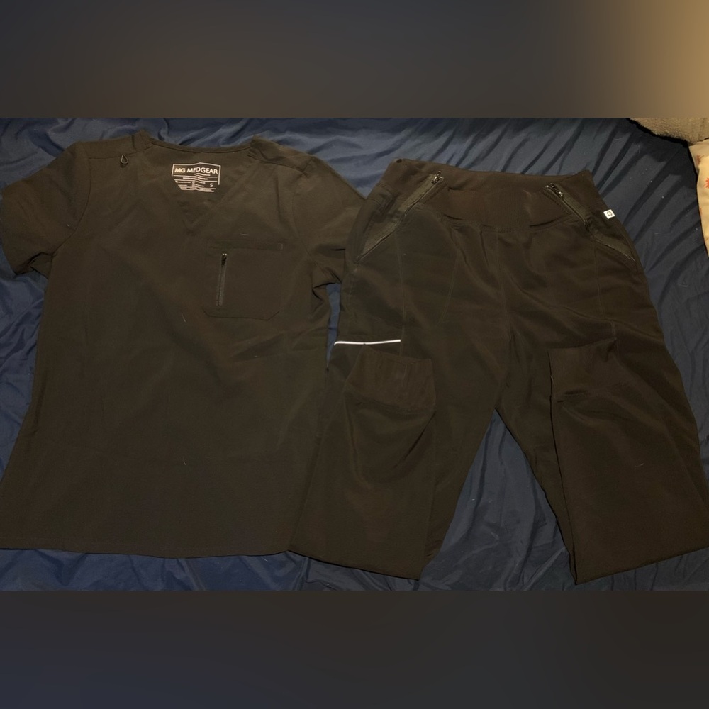 2 sets of mix matched used scrubs